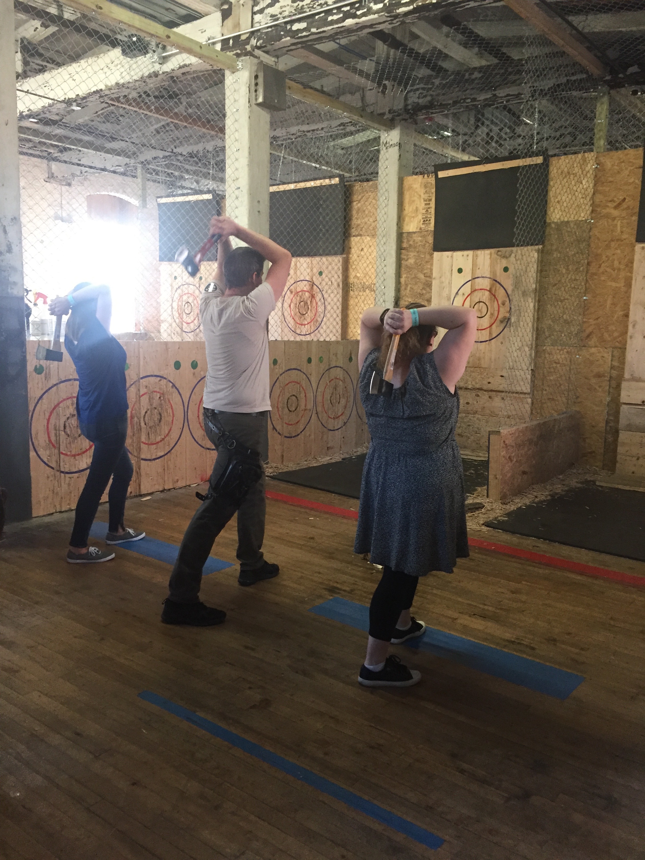 Learning the proper technique for throwing axes.